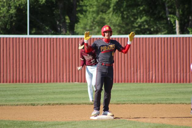 Dale senior Casen Richardson holds up his hands after hitting a double.