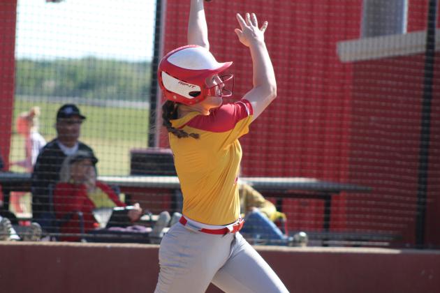 Dale's Makenzie Ellis hits a home run during the third inning of the April 22 home game with Class 6A Mustang. In Class 4A, the Lady Pirates slow pitch team lost, 8-17, making their record 29-6. They were scheduled to play in regionals on April 23. Countywide & Sun/Natasha Dunagan