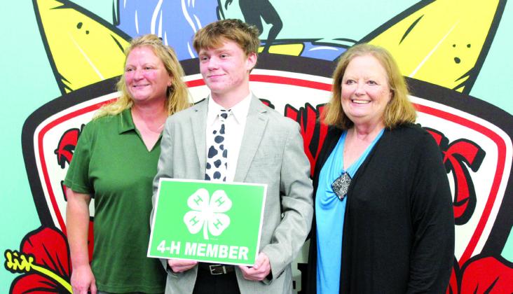 Tecumseh 4-H Club member Taylor Marrs was given the Pottawatomie County 4-H Senior Hall of Fame Award during the 4-H Awards Banquet, held at the North Rock Creek High School Cafeteria on Oct. 23. He is shown with his mother, Sara McGaha, left, and his grandmother, Barbara McGaha. Countywide & Sun/Natasha Dunagan