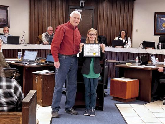 Bethel 5th Grade Student Ember Luna was presented a Certificate of Recognition at the Jan. 16 meeting of the Shawnee City Commissioners after raising 1,175 pound of pet food for the Shawnee Animal Shelter.