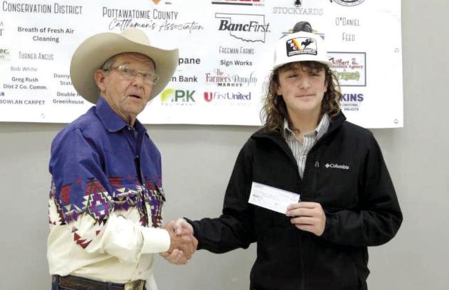 Sawyer Speers placed 10th and received a $700 check, presented by Bob Freeman, in the Second Annual Beef Quiz Bowl. File Photo