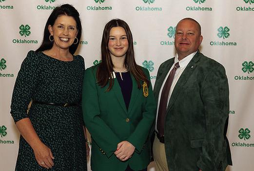 North Rock Creek eighth-grader Grace Hobbs, center, poses with Oklahoma Secretary of Agriculture Blayne Arthur and State Representative and Agriculture Committee Chair Dell Kerbs during the 25th Annual 4-H Day at the State Capitol on April 17. Hobbs is an Oklahoma 4-H State Ambassador. Photo provided.