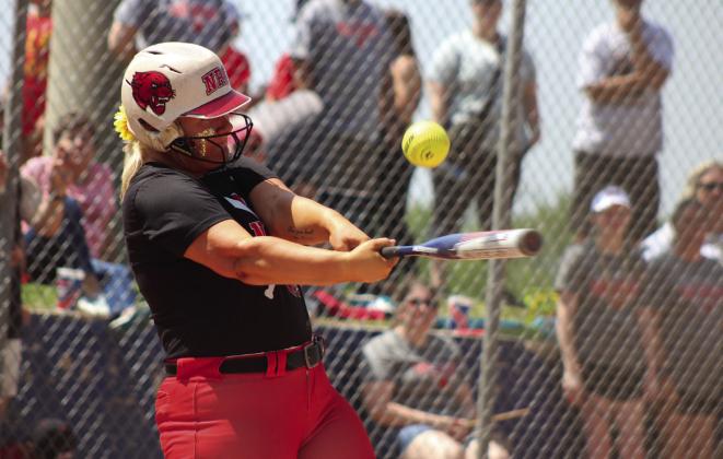 North Rock Creek’s Hannah Earlywine gets a hit in the second inning of the Class 5A Slow Pitch State Semifinals with Tecumseh.