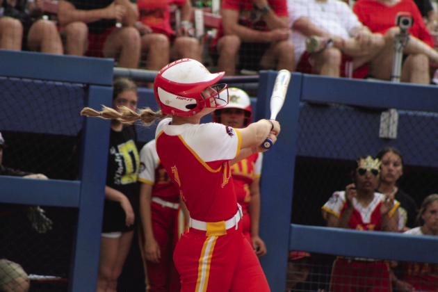 Dale’s Heartly Snyder hits a home run in the first inning of the Class 4A Slow Pitch State Championship against Silo.