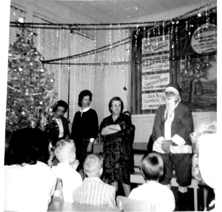 Santa Claus visits New Hope School in 1964. Dr. Donald Rominger was a teacher there in the school year of 1961-’62 and has fond memories of Santa handing out bags of “treats, candies and fruits” to the students. Photo courtesy of the Collection of Glenn Dale and Kathryn Carter.
