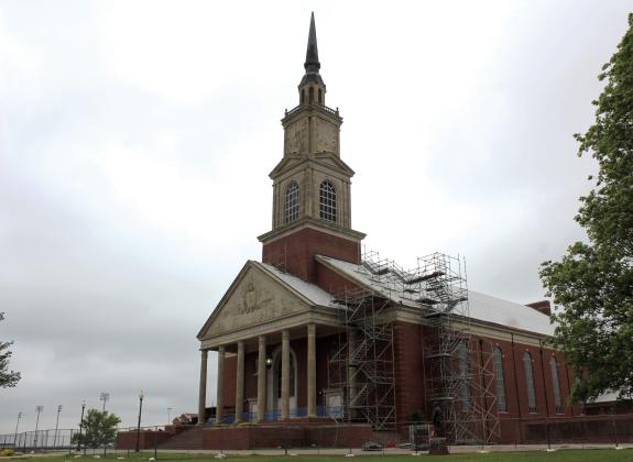 Raley’s Chapel still has scaffolding and is fenced off for repairs almost a year after the tornado went through Shawnee. Countywide & Sun/Natasha Dunagan
