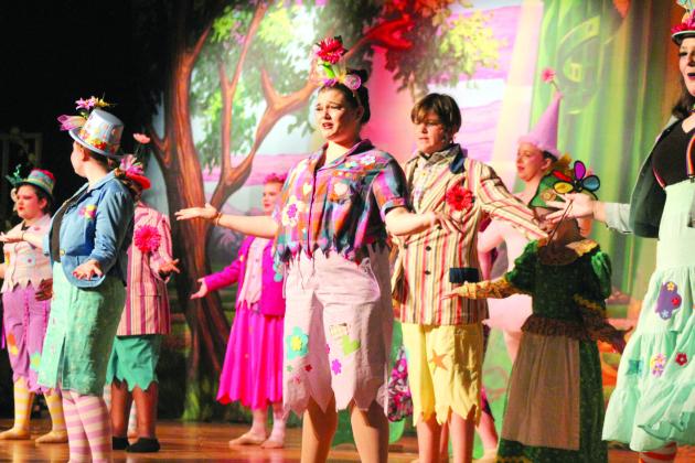 The Munchkins fill the stage in colorful costumes to sing and dance during the Tecumseh Middle School and High School production of "The Wizard of Oz" on April 28. The Munchkins were played by Addison Arnold, Levi Carter, Lydia Clagg (center), Dani Clark, Ramona Griffin, Reegan Kirby, Lilly Klutts, Camryn Medley, Ethan Quinn, Serenity Shackleford and Abigail Weeks (not in order). They gave three performances for all the Tecumseh students and two for the public.